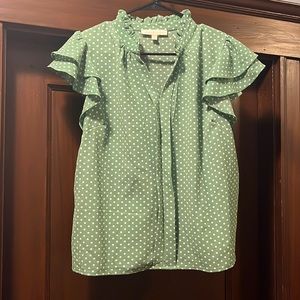 Green polka dot shirt
